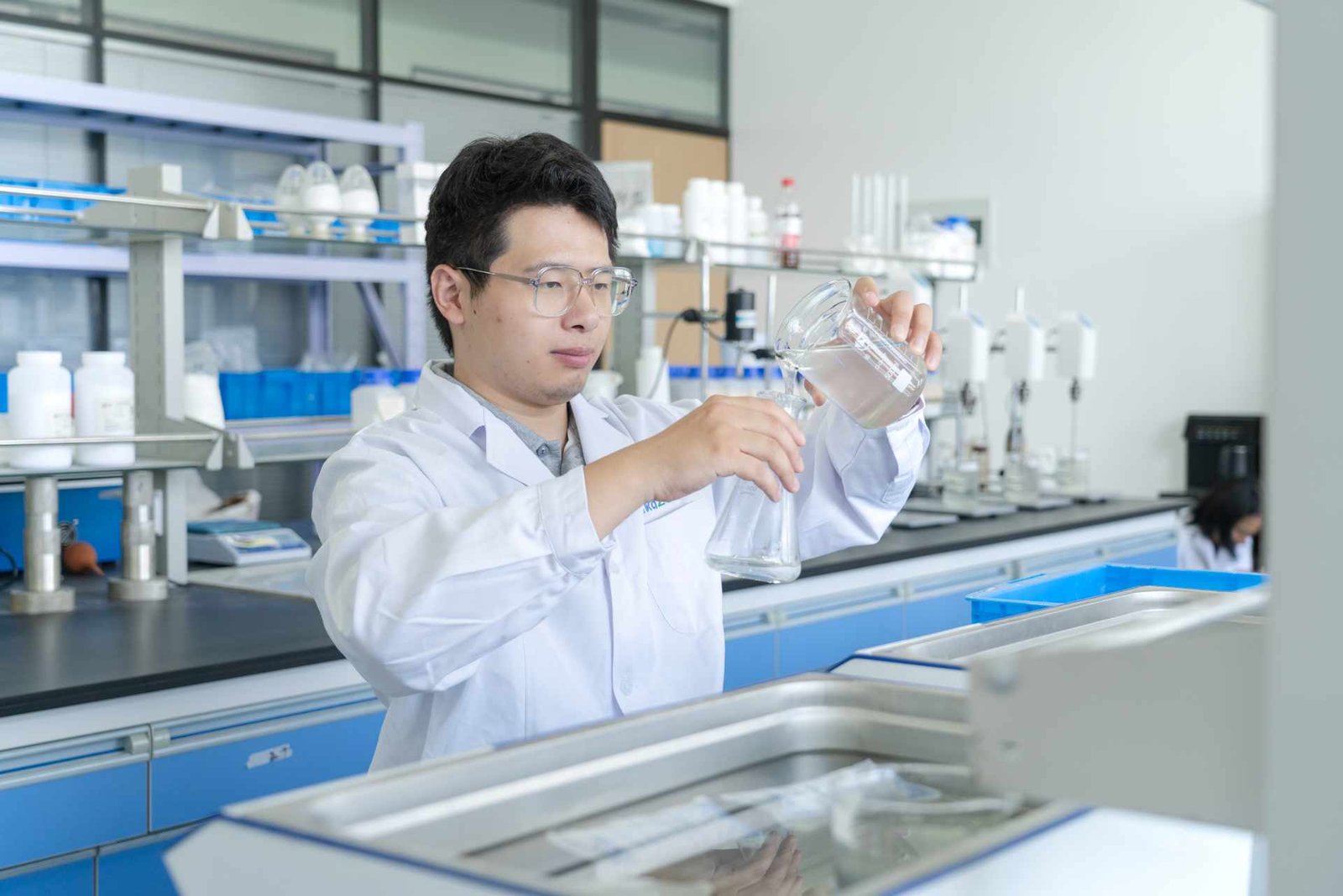 Worker conducting trial application test