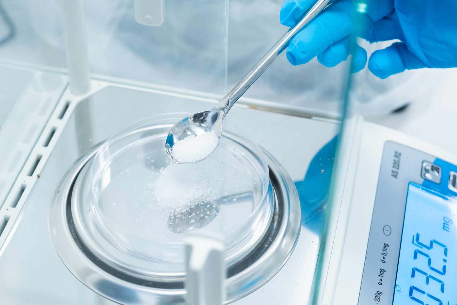 Laboratory technician evaluating building material sample performance test