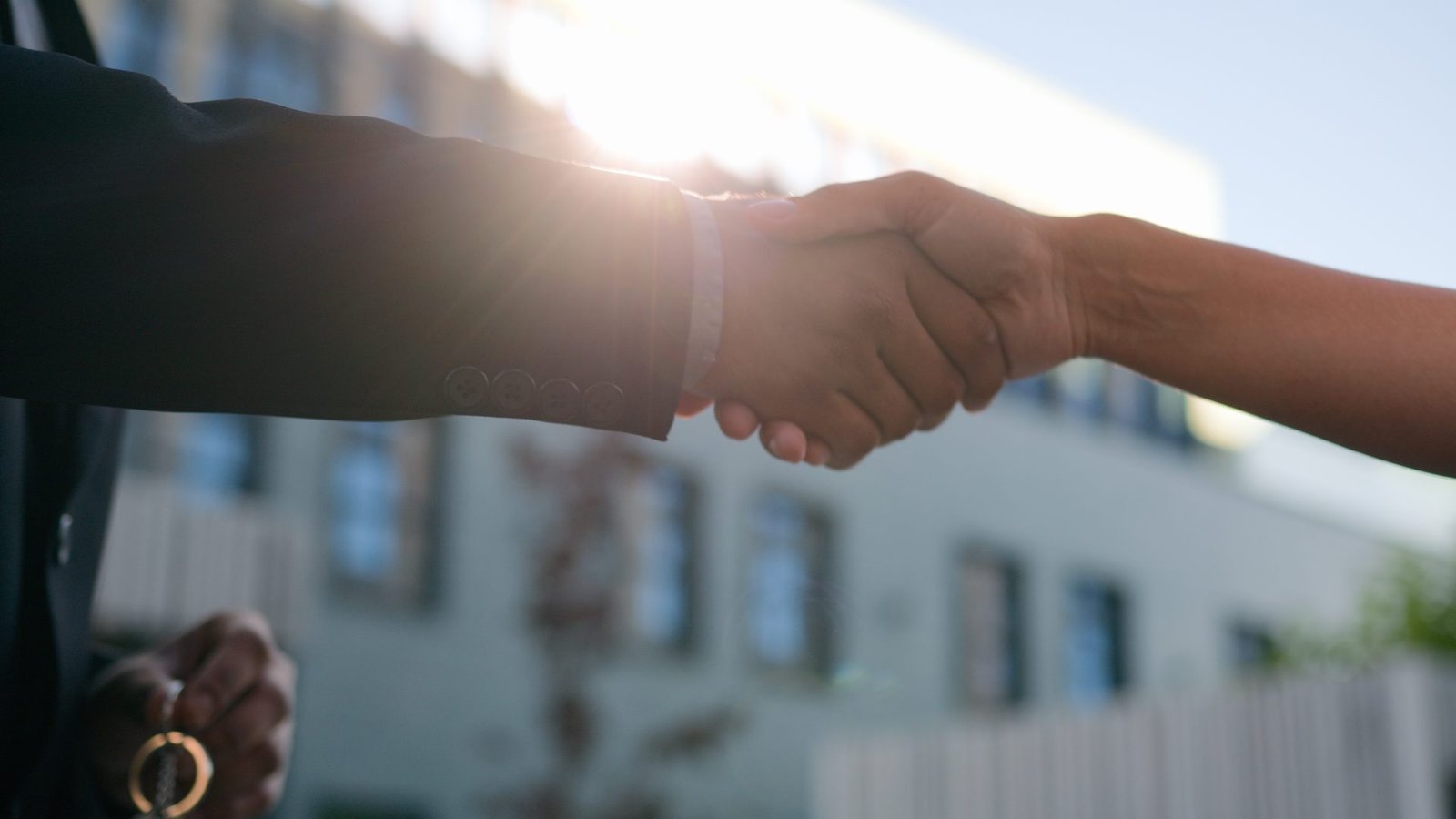Team handshake confirming stabilized production results