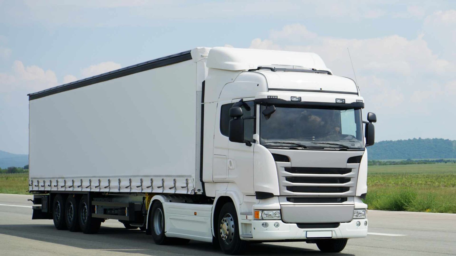Delivery truck at loading dock for logistics coordination