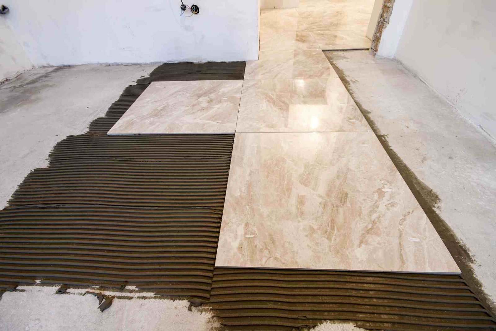 Tile adhesive application