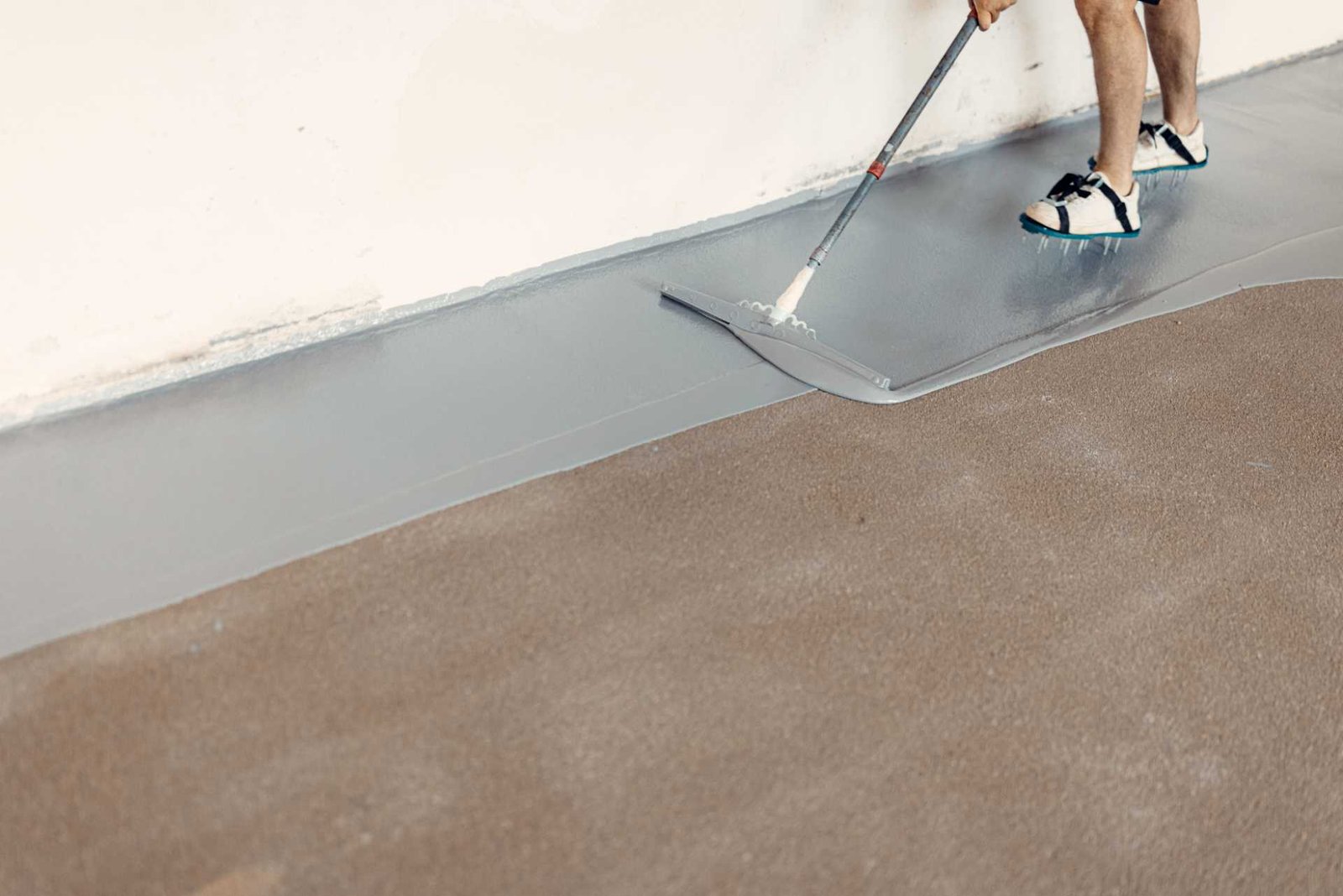 Smooth self-leveling concrete floor surface in modern interior space