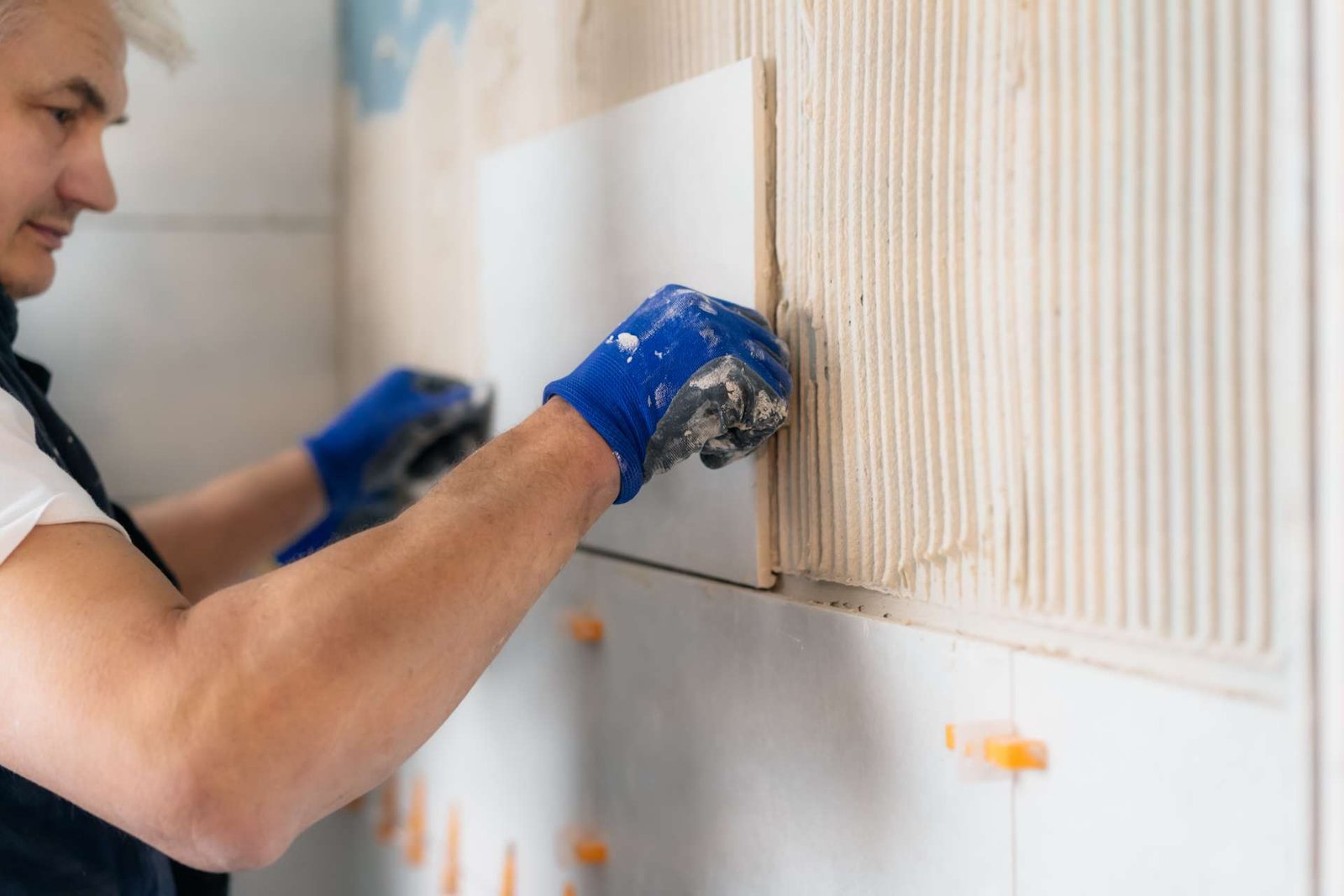 Troweling tile adhesive