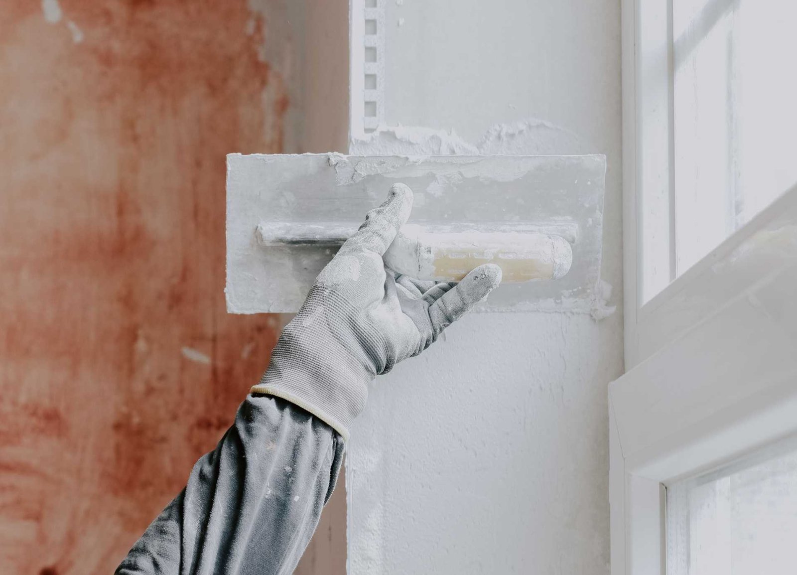 Gypsum plaster application on wall