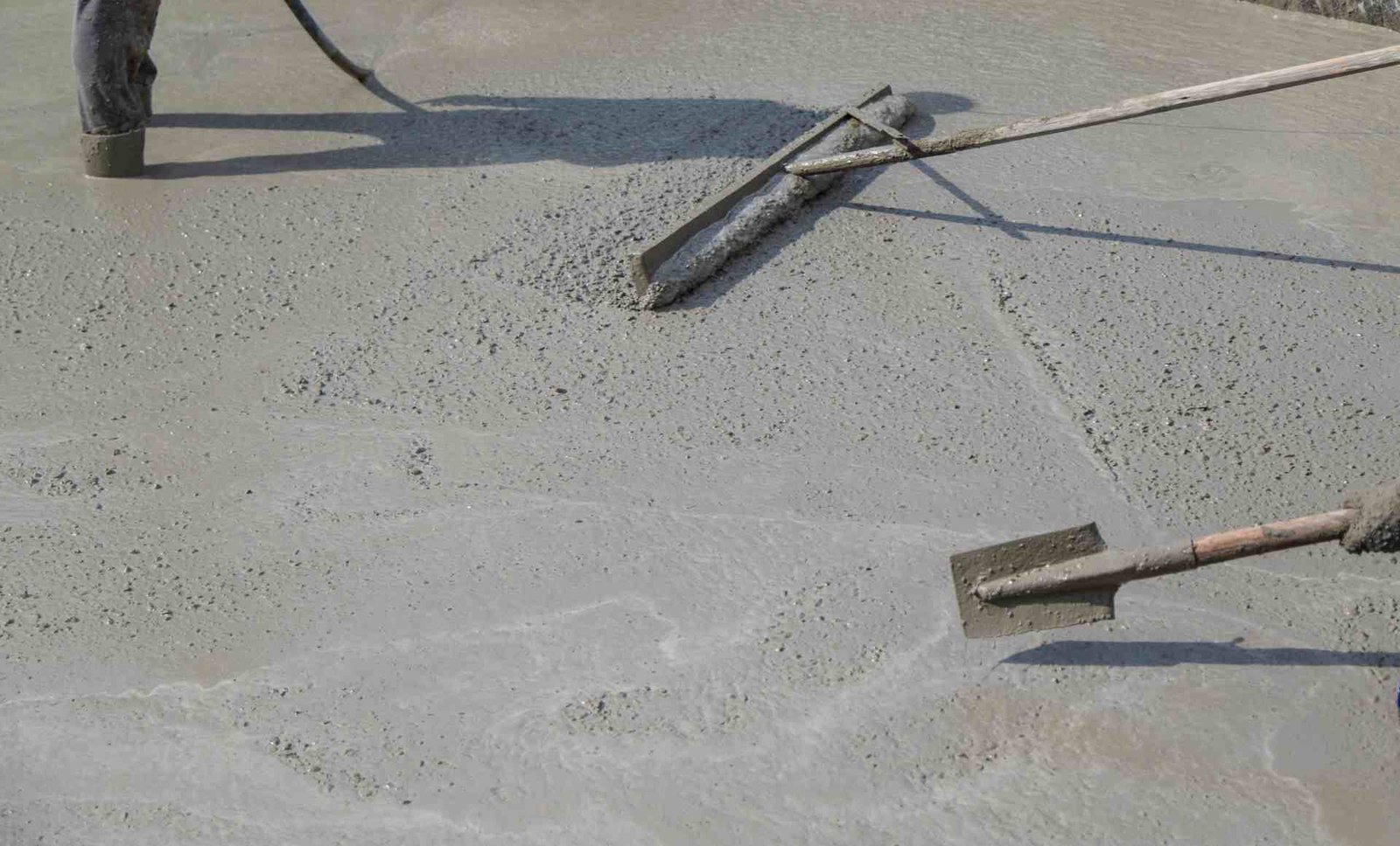 Wall primer application — roller on concrete